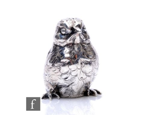 A hallmarked silver pounce pot modelled as a seated chick, height 7cm, weight 82g, Import marks Chester 1901, Berthold &amp; 