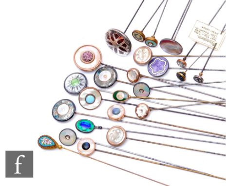 A collection of early 20th Century and later hat pins, some hallmarked silver, to include a Charles Horner green and blue ena