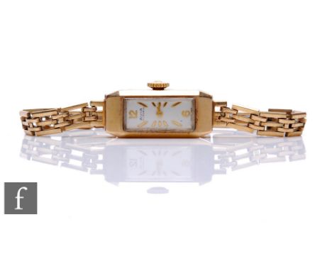 A lady's 9ct hallmarked Avia manual wind wrist watch, gilt batons to a rectangular dial, to a 9ct gate bracelet, total weight