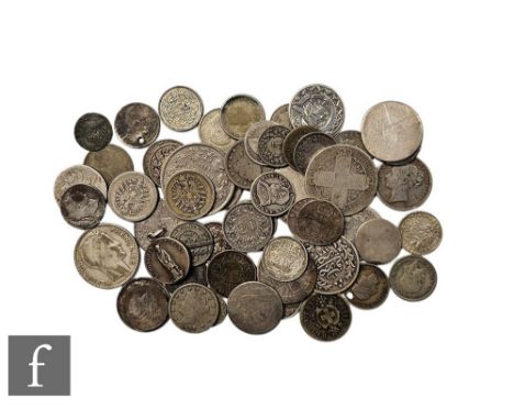 Two Victoria gothic florins, an 1885 shilling and other assorted silver coinage, some foreign, various grades. (qty)