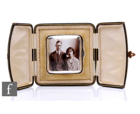 A hallmarked silver cushioned rectangular cigarette case with an enamel portrait of the engagement photograph of Edward VI an