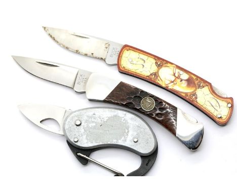 Three Buck folding knives (blade lengths 4-5 cm) P&amp;P Group 2 (£18+VAT for the first lot and £3+VAT for subsequent lots) 