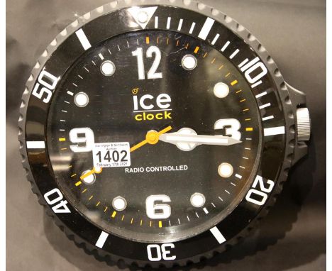 Radio controlled black Ice Clock wall clock. P&amp;P Group 3 (£25+VAT for the first lot and £5+VAT for subsequent lots) 