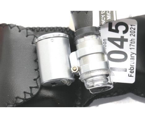 Three 60x jewellery/currency detecting loupes with LED light and leatherette pouch. P&amp;P Group 1 (£14+VAT for the first lo