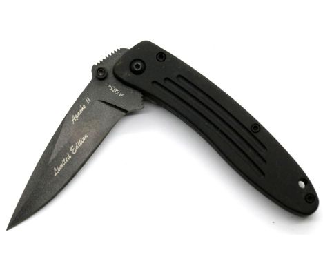 New old stock American CRKT 7002B folding knife with ATS 354 blade. P&amp;P Group 2 (£18+VAT for the first lot and £3+VAT for