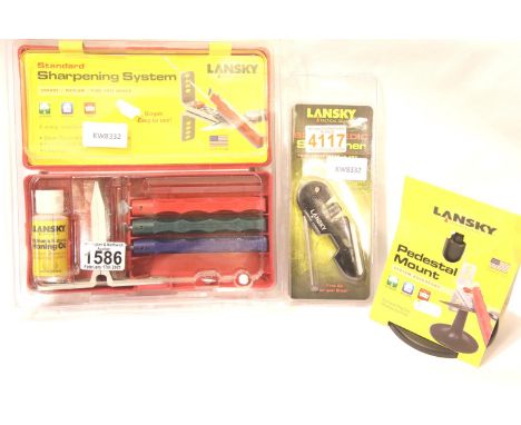 Cased Lansky sharpening system, a cased Lansky blademedic sharpener and a pedestal mount. P&amp;P Group 2 (£18+VAT for the fi