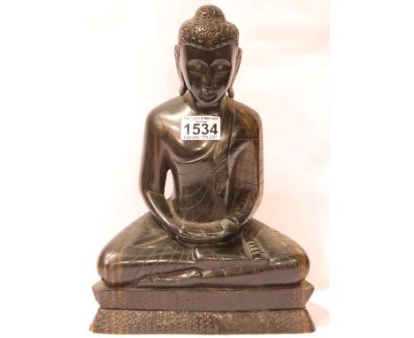 Eastern carved hardwood model of a seated Guan Yin figure, H: 35 cm. P&amp;P Group 3 (£25+VAT for the first lot and £5+VAT fo