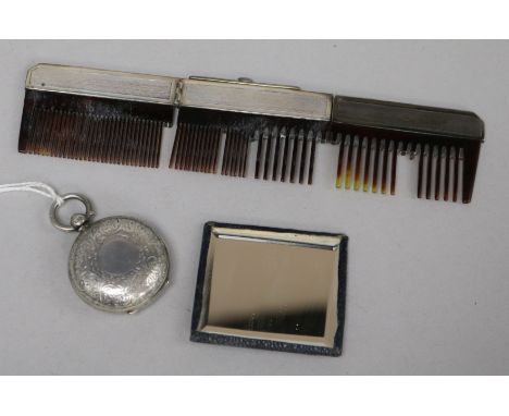 A late Victorian silver sovereign case, Birmingham, 1900 and a portable white metal mounted comb and a mirror, in pouch.