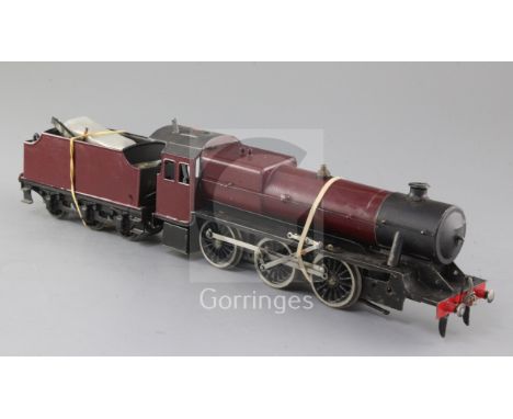 A Bassett-Lowke live steam O gauge 2-6-0 tender locomotive, unmarked crimson livery, (dissembled) but components present, ove