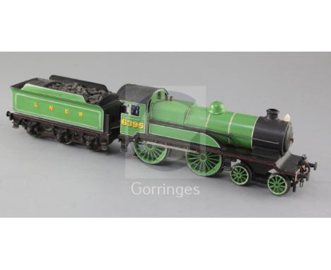 A Leeds model Co O gauge 4-4-0 LNER locomotive and tender, number 6395, green livery, 3 rail, overall 41cm, needs attention