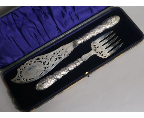 A cased pair of Victorian silver fish servers, Henry Howson, Sheffield, 1861, knife 32.5cm.