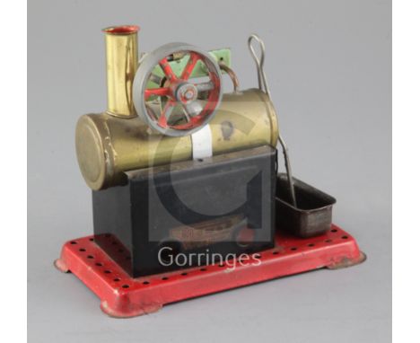 A Mamod live steam static engine, 17cm and a Mamod live steam road roller, 26cm