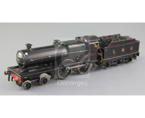 A Bassett-Lowke? O gauge clockwork 4-4-0 compound locomotive and tender, number 601, black livery LMS, overall length 39cms