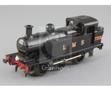 A scratch built Jinty class O gauge 0-6-0 LMS tank engine, black livery, number 7301, 3 rail, 22cm