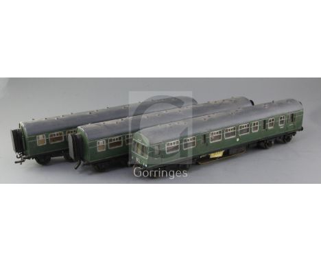 A three car set, British Rail D.M.U. single motors, skate pick up no's. E56407, 8 and 9, with interior lighting, overall 114c