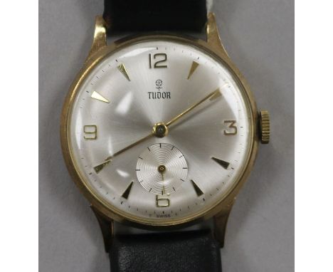 A gentleman's 1960 9ct gold Tudor manual wind wrist watch, on leather strap with Rolex buckle, with Tudor box, case back insc