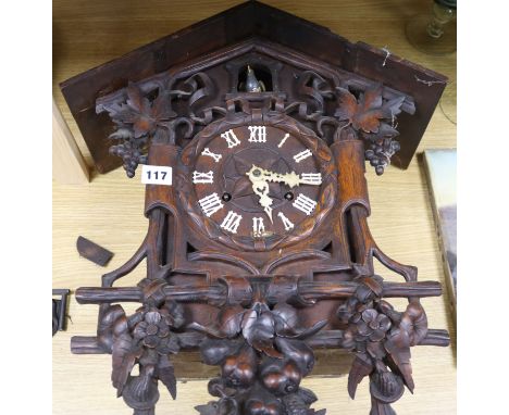A Black Forest cuckoo clock H.53cm. W.43cm.