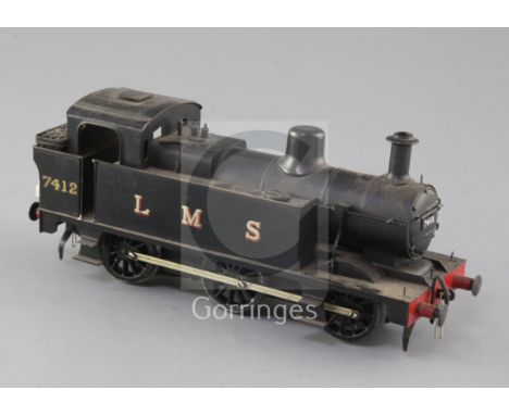 A scratch built O gauge 0-6-0 tank locomotive, number 7412, LMS black livery, 3 rail with skate, overall 22cm