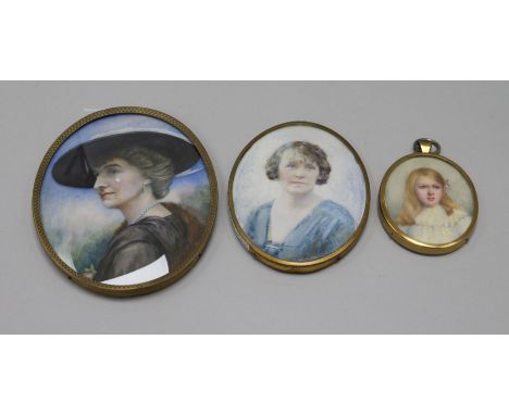 Three early 20thC portrait miniatures on ivory of ladies largest 12 x 9.5cm.