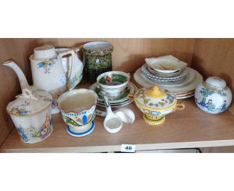 Shelf of assorted china
