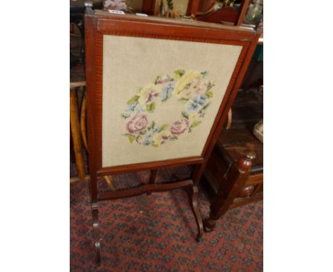 Edwardian mahogany framed metamorphic tapestry firescreen with shelf