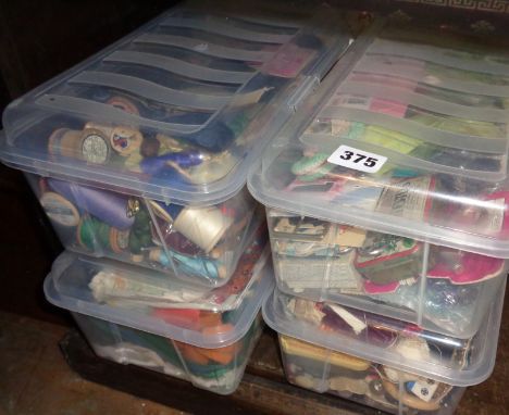 Four boxes containing vintage sewing bits, cotton reels, needle cases, scissors etc