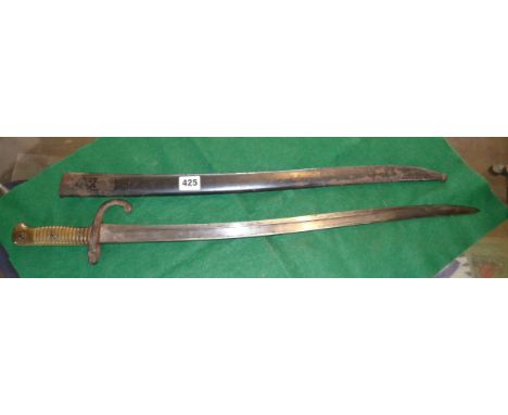 19th century French bayonet and steel scabbard, the 57cm blade marked 'Elienne, 1872'