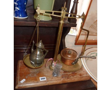 Victorian brass shop scales and weights, a small Victorian copper saucepan with lid and a pewter chocolate pot