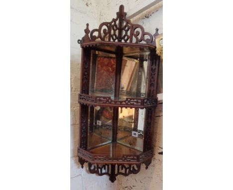 Victorian mahogany corner shelf with mirrored back and fretwork galleries