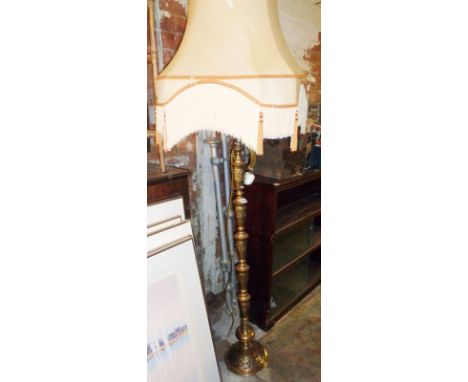 Brass standard lamp with fringed shade
