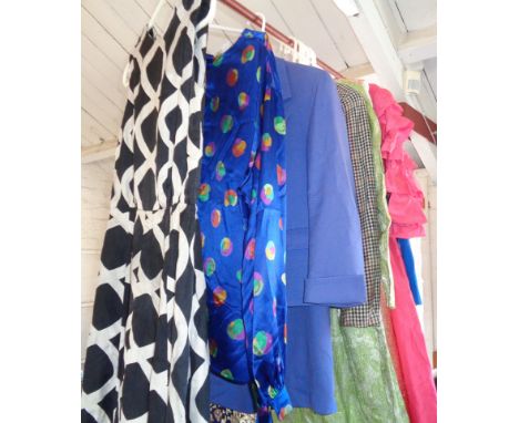 Collection of vintage clothing from the 1970s and 80s. Makers include Emanuel Ungaro, Jaeger, Aquascutum, etc. Inc. maxi dres