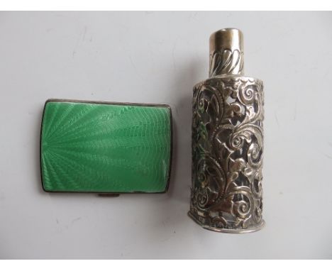 A green guilloche enamel cigarette case – Birmingham 1936 and a pierced scent bottle with glass liner – AWP, Birmingham 1900 