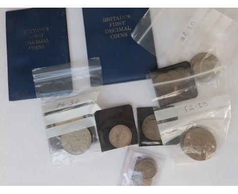  Two sets of British 'First Decimal Coins, crowns, US one dollar, etc.