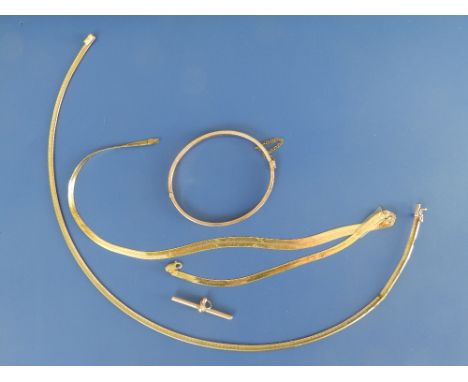 Two 9ct gold choker necklaces together with a bangle – all damaged and a fob chain end bar.  (4)