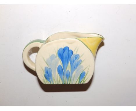 A Clarice Cliff blue crocus pattern cream jug – small chip near spout.
