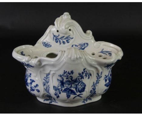 An 18th Century Worcester porcelain hanging soap holderDecorated in the 'Cabbage leaf' pattern with butterflies, blue crescen