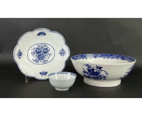 Three pieces of 18th Century blue and whiteTo include a Worcester bowl having relief moulding of floral motifs, height 5cm, d