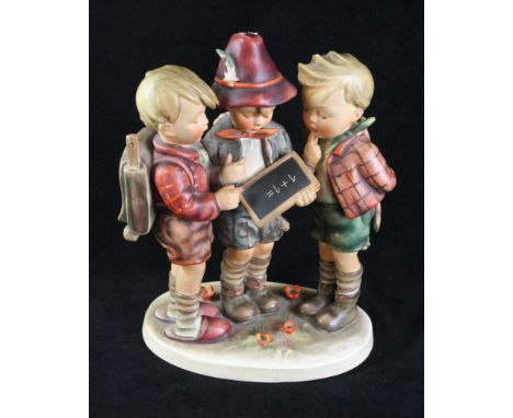 A large Goebel Hummel figure groupDepicting three children standing adding up a sum, impressed signature and blue factory mar
