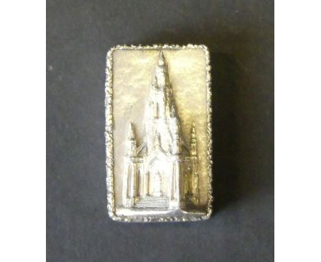 A Victorian silver castle top vinaigretteOf rectangular form, the lid with cast decoration of The Scot Memorial in Edinburgh,