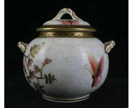 A 19th Century Worcester hand-painted twin handled lidded vase and coverDecorated with roses with gilt highlights, puce facto