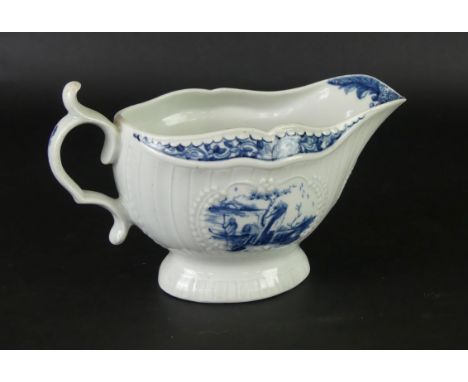 An 18th Century Worcester blue and white sauce boatDecorated with moulded panels and in the 'Fisherman a Billboard Island' pa