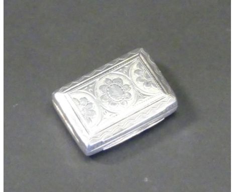 A George IV silver vinaigretteOf rectangular form, with engraved foliate decoration with engraved wavy borders, with an appli