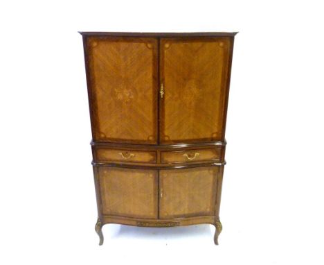 A H&L Epstein Ltd Louis XVIII style kingwood inlaid drinks cabinetSerpentine front with twin doors with floral decoration, op