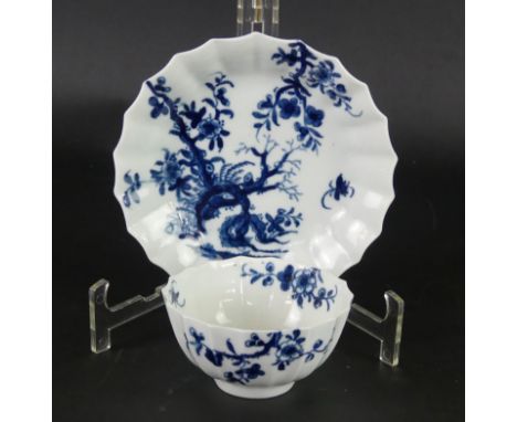 An 18th Century Worcester blue and white tea bowl and saucerDecorated in the 'Prunus Root' pattern, diameter of saucer 13.5cm