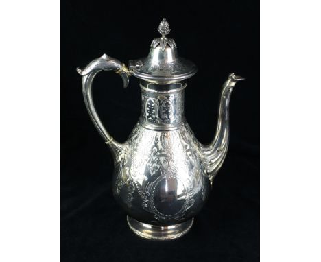 A Victorian silver coffee potOf baluster form, profusely engraved with repeating swag and foliate patterns, either side of va