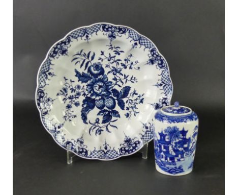 Two pieces of 18th Century Worcester blue and white porcelainTo include a cylindrical tea caddy and cover decorated in the 'W