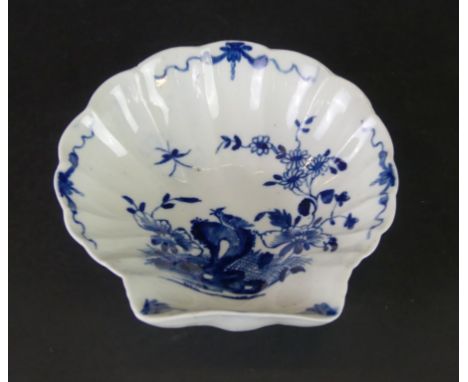 An 18th Century Worcester blue and white shell shaped dishDecorated in the 'Two Peony Rock Bird' pattern, length 13cm    COND