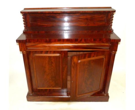 A Victorian mahogany chiffonier, mid 19th CenturyWith two shelf back with barley twist supports, with frieze drawer, column s