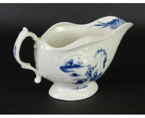 An 18th Century Worcester blue and white sauce boatDecorated in the 'Man with Bomb' pattern, crescent mark to base, height 11