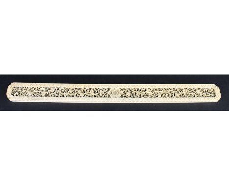 A late 18th/19th Century Chinese ivory Scholars ruleHaving pierced floral decoration, length 34cm   CONDITION REPORT:  Light 